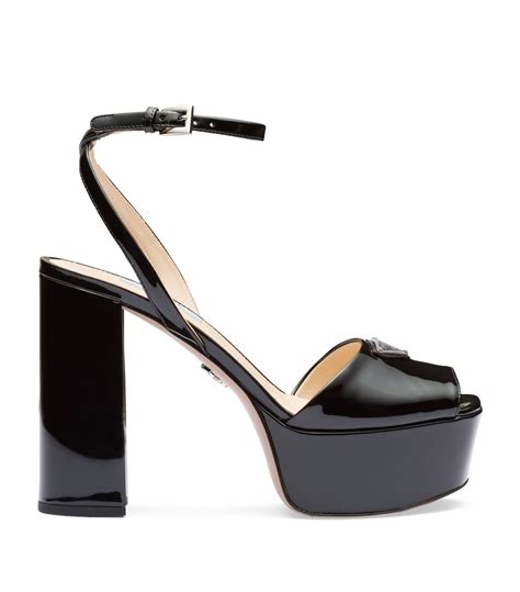 prada black laquered platforms with red pattened leather tops|Prada patent leather sandals.